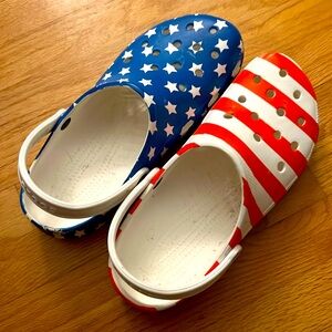 Mens red, white and blue Crocs. Worn once. Size 11. Smoke free home
